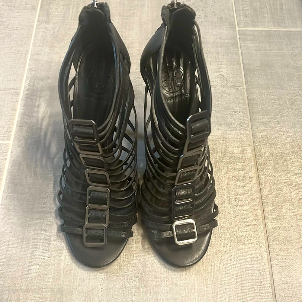 Black 3.5 inch sandals with zippers.